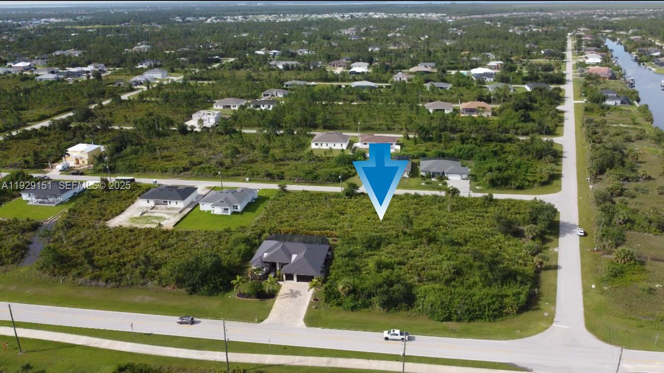 13581 Jeronimo Lane Port Charlotte, FL 33981 - Photo 5 of 5 an aerial view of house with yard