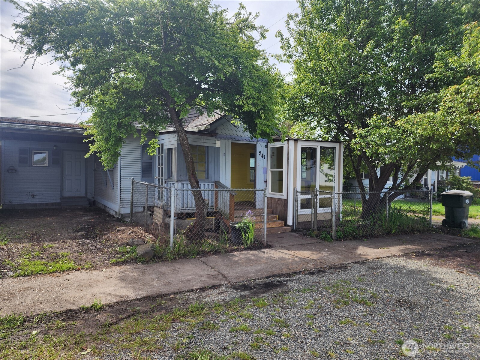 241 Southwest 10th Street Chehalis, WA 98532 - Photo 2 of 16 a front view of a house with garden