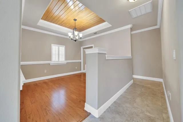 a bathroom with a toilet sink vanity tub and shower