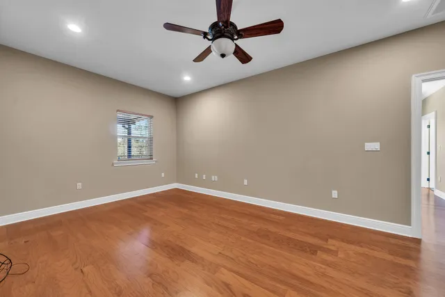 a view of a hallway with a white walls
