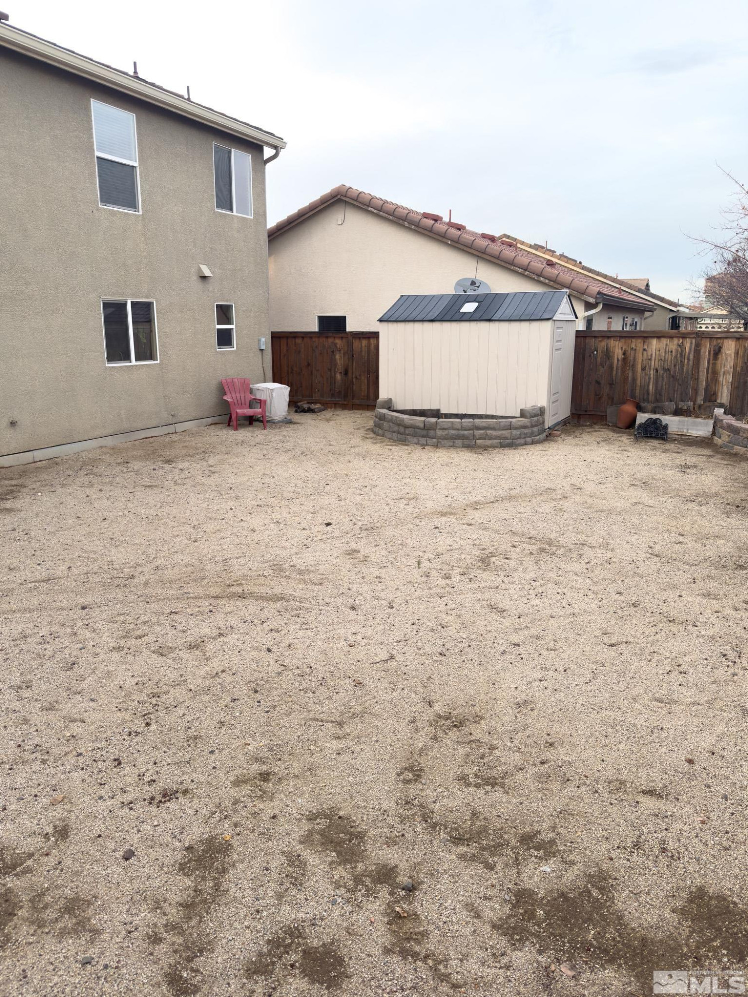 11630 Verazae Drive Reno, NV 89521 - Photo 11 of 16 a view of a house with backyard and sitting area