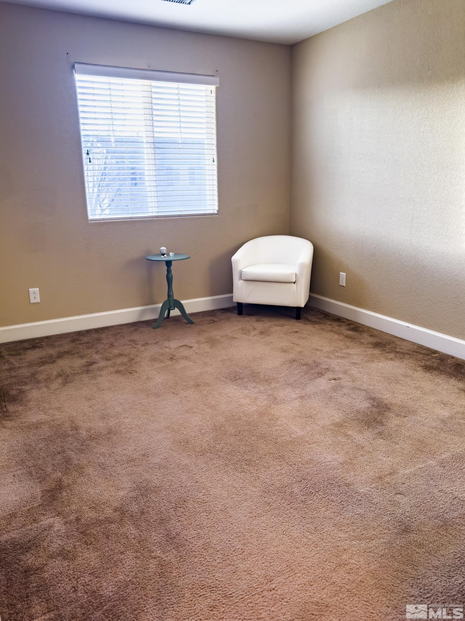 11630 Verazae Drive Reno, NV 89521 - Photo 15 of 16 a view of a room with a window and bathroom