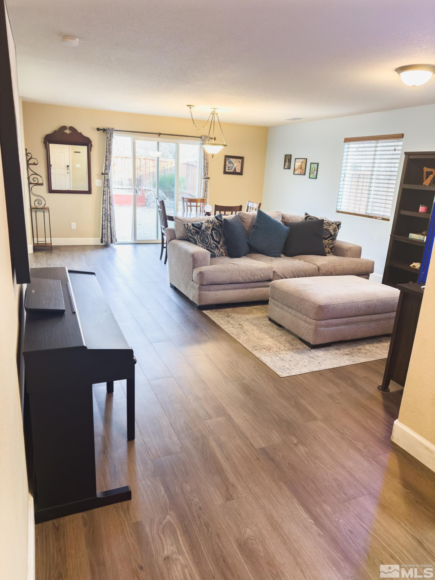 11630 Verazae Drive Reno, NV 89521 - Photo 2 of 16 a living room with furniture and wooden floor