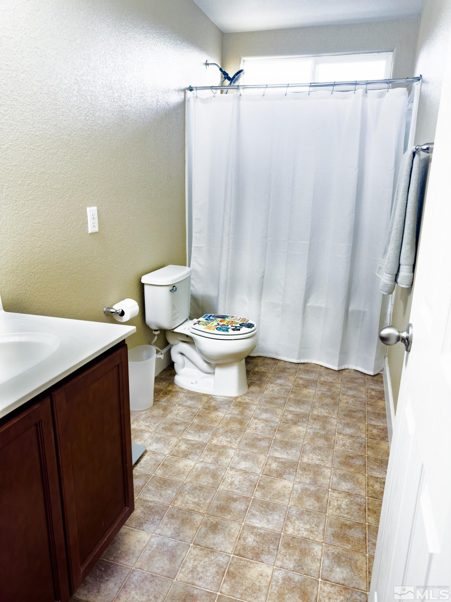 11630 Verazae Drive Reno, NV 89521 - Photo 6 of 16 a bathroom with a sink toilet and shower