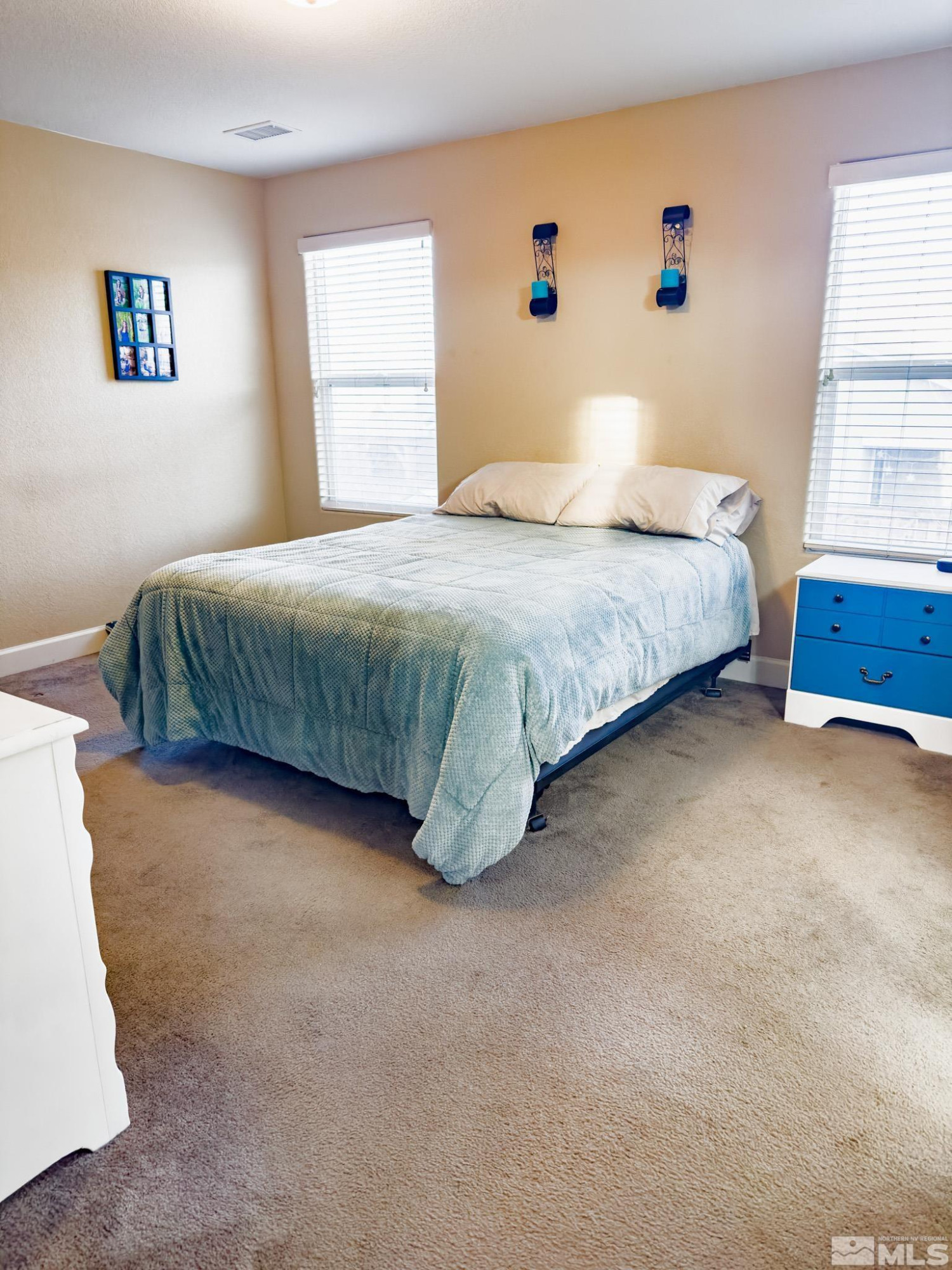 11630 Verazae Drive Reno, NV 89521 - Photo 7 of 16 a bedroom with a bed and a window