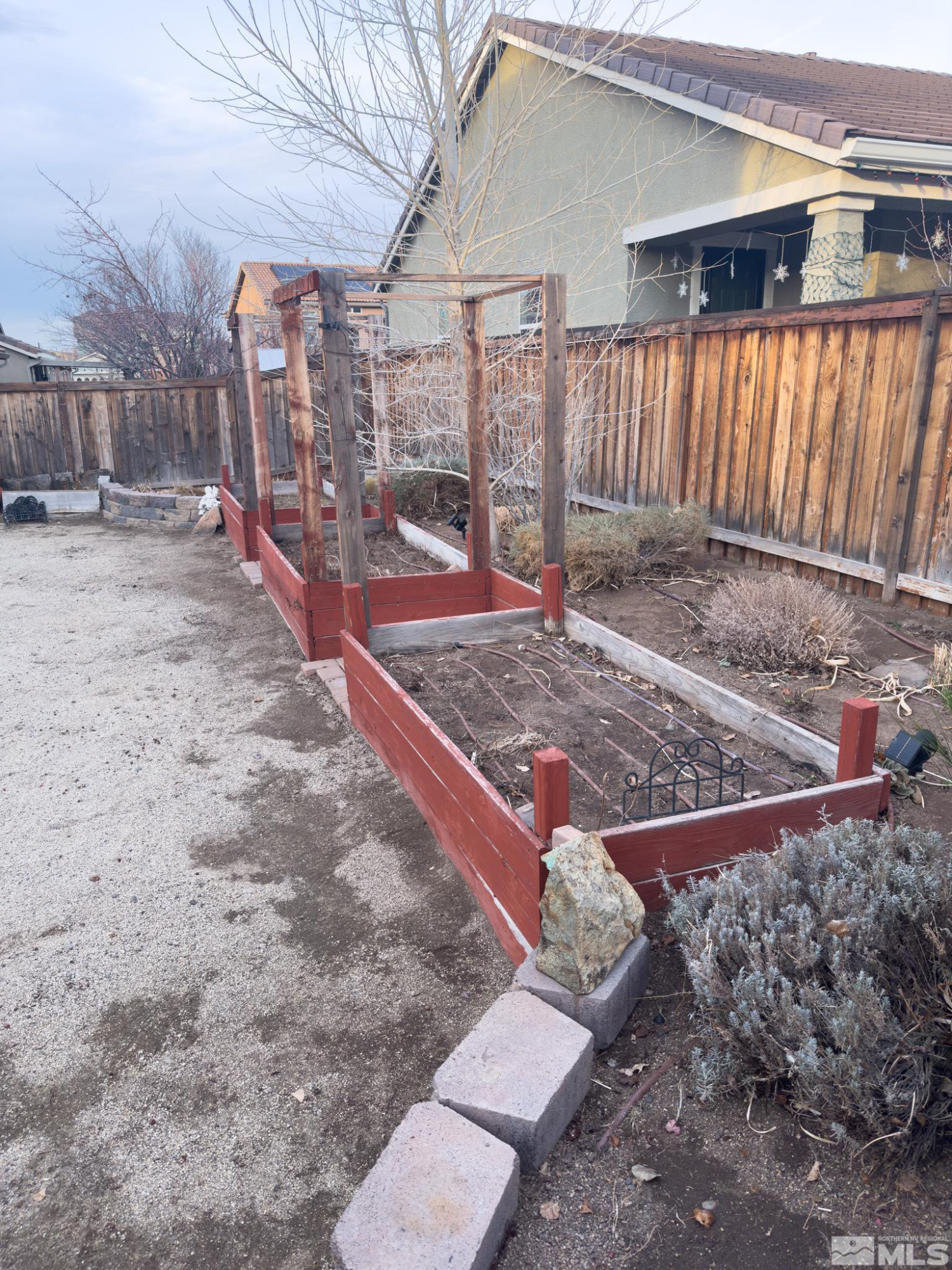 11630 Verazae Drive Reno, NV 89521 - Photo 10 of 16 a view of a backyard with wooden fence