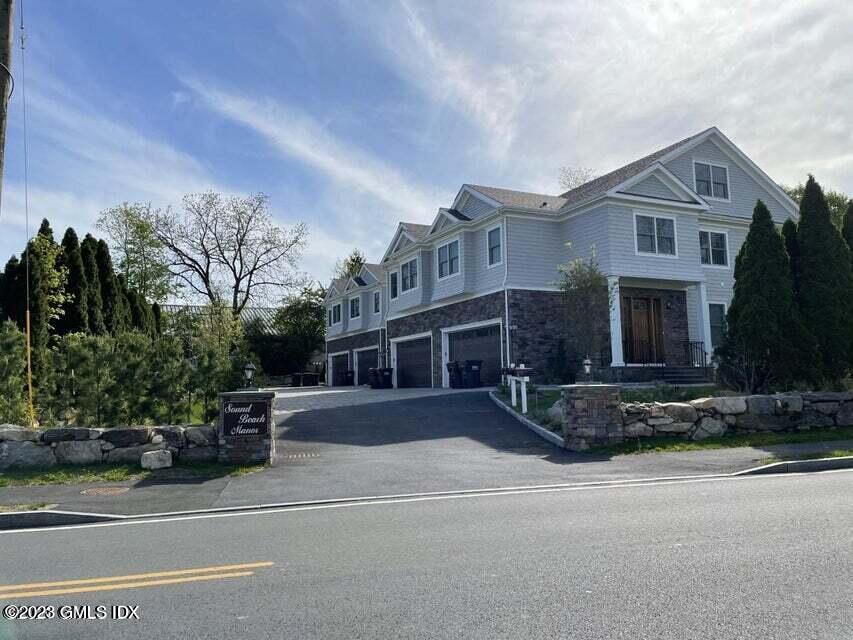 8 Sound Beach Ave Extension, Unit 4 Greenwich, CT 06878 - Photo 27 of 31 a view of multiple houses with a street