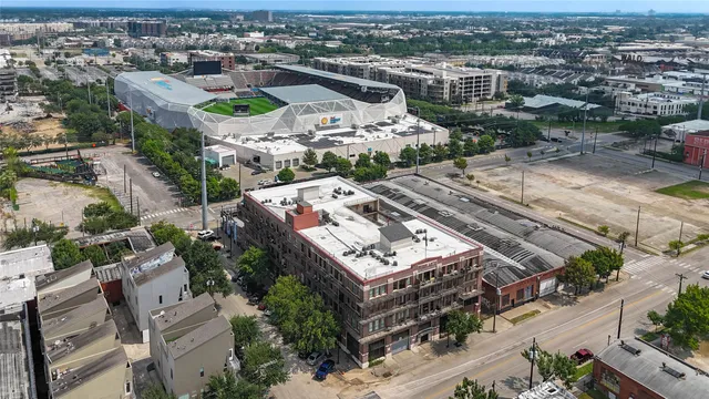 an aerial view of a city with lots of residential buildings