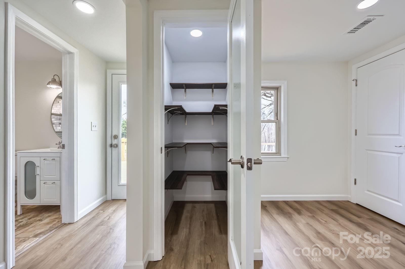 3225 Liberty Road Gold Hill, NC 28071 - Photo 16 of 24 a view of hallway with wooden floor