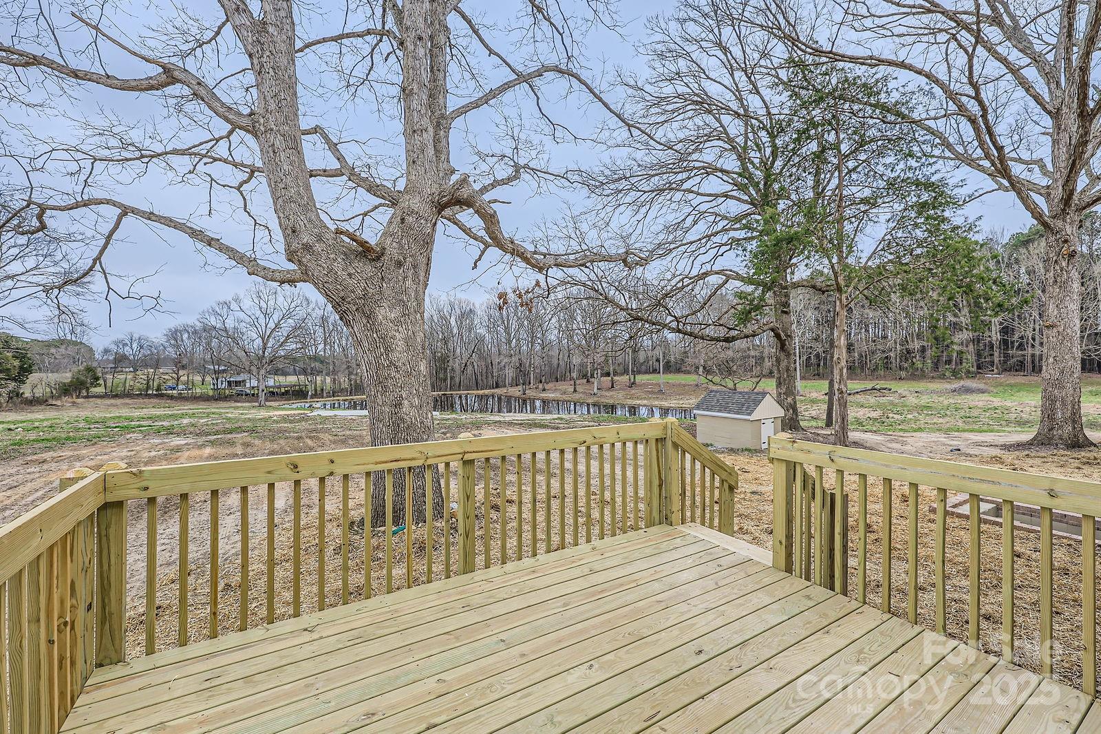 3225 Liberty Road Gold Hill, NC 28071 - Photo 20 of 24 a view of balcony with wooden floor and fence