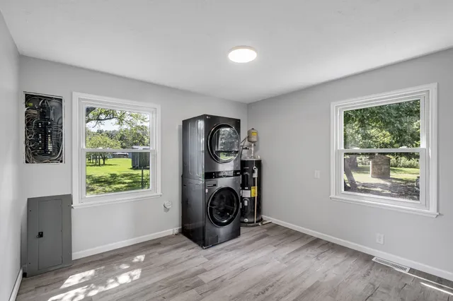 a view of workspace with window wooden floor and windows