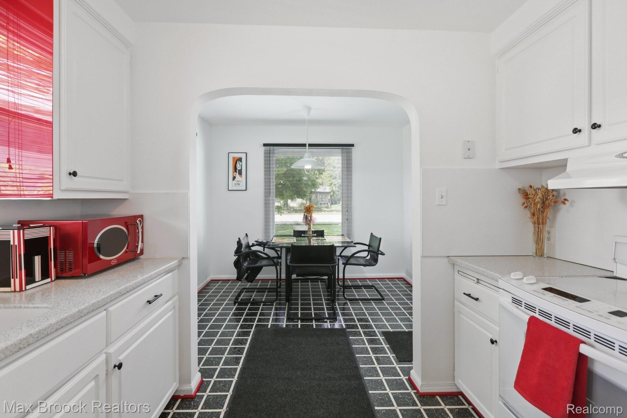 1220 East Maple Road Birmingham, MI 48009 - Photo 6 of 31 Kitchen to Dining
