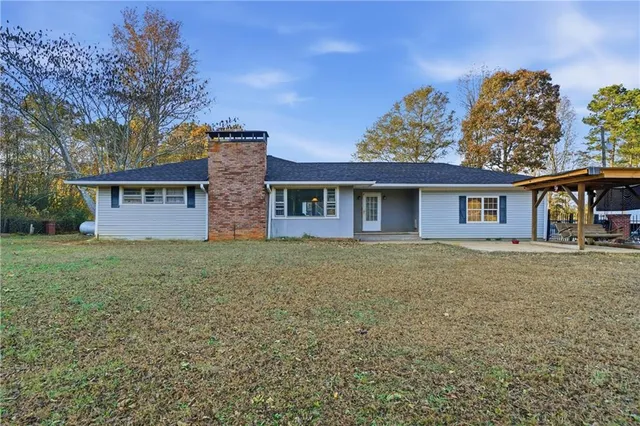 front view of a house with a big yard