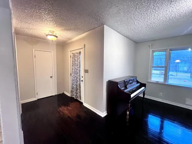 a kitchen with stainless steel appliances granite countertop a sink and a cabinets