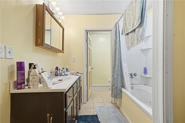 a view of room with wooden floor