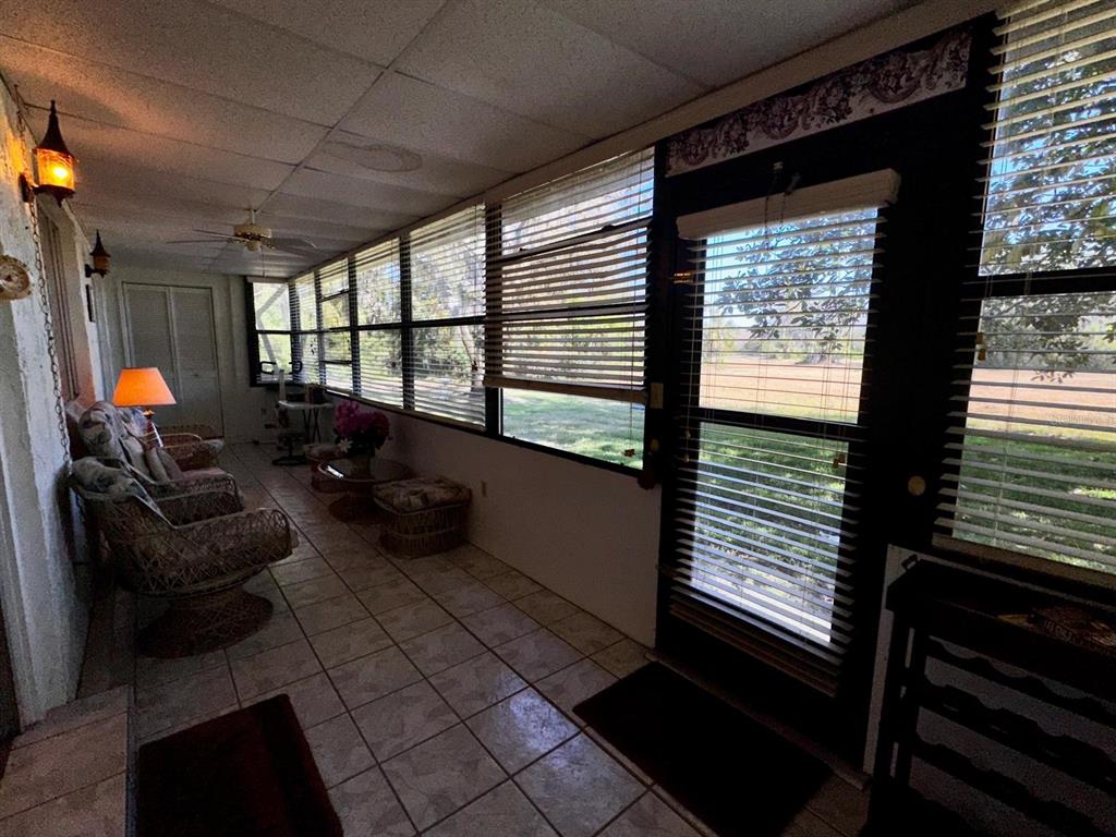 7040 Cognac Drive, Unit 1 New Port Richey, FL 34653 - Photo 32 of 45 a living room with furniture