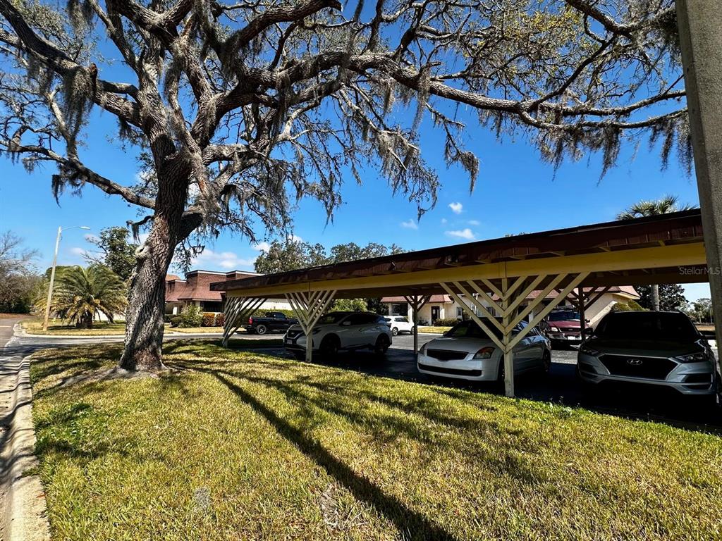 7040 Cognac Drive, Unit 1 New Port Richey, FL 34653 - Photo 37 of 45 a view of car parked