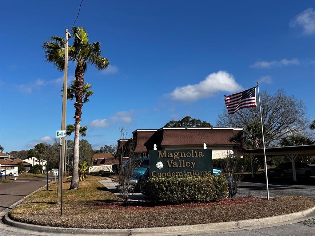 7040 Cognac Drive, Unit 1 New Port Richey, FL 34653 - Photo 45 of 45 a front view of a house with a yard