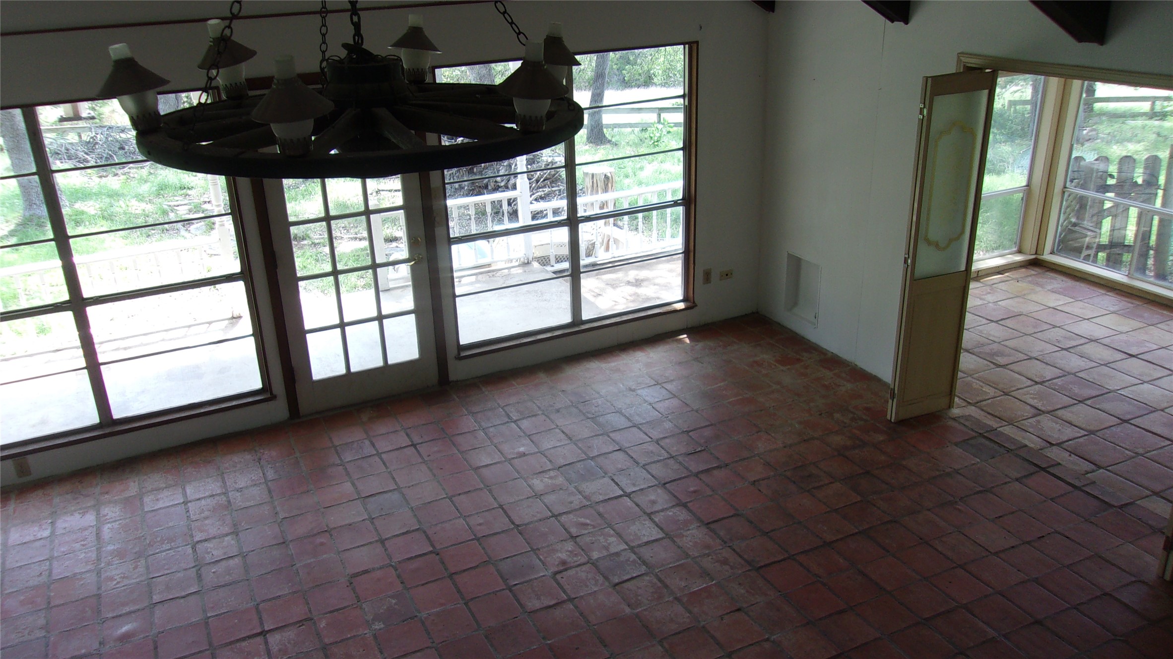 702 Cottonwood Creek Road Dripping Springs, TX 78620 - Photo 10 of 31 Spacious interior with terracotta-style tile flooring throughout