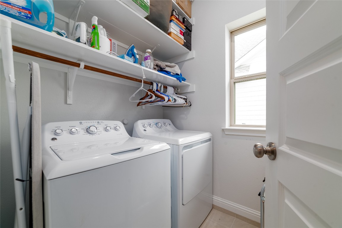 8505 Leroi Drive, Unit 358 Austin, TX 78744 - Photo 18 of 37 a utility room with dryer and washer