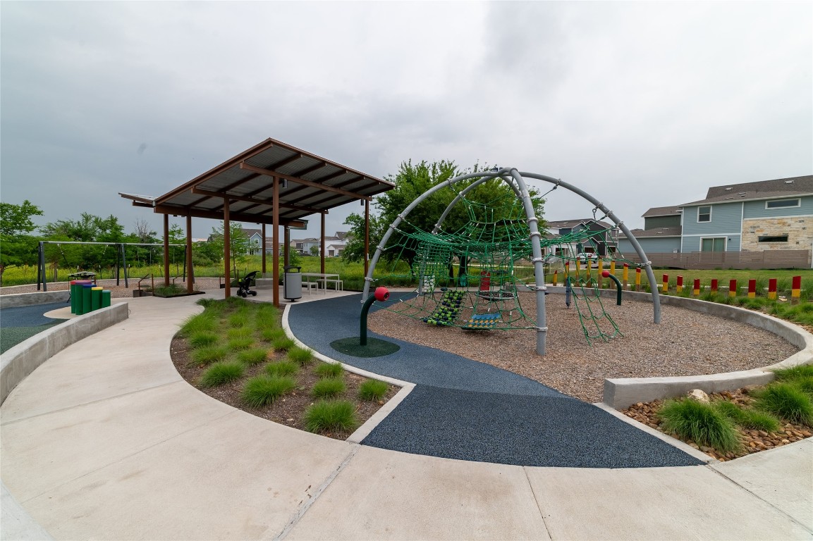 8505 Leroi Drive, Unit 358 Austin, TX 78744 - Photo 26 of 37 a view of a backyard with sitting area