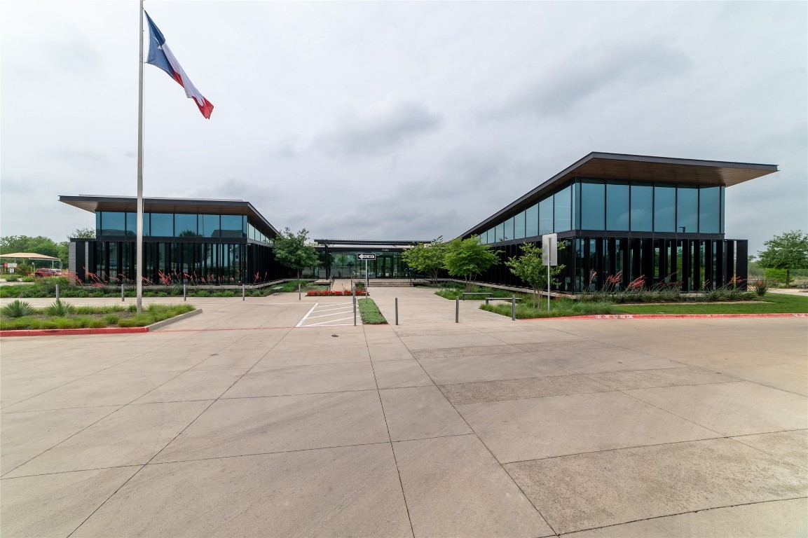 8505 Leroi Drive, Unit 358 Austin, TX 78744 - Photo 27 of 37 a view of a building with a swimming pool