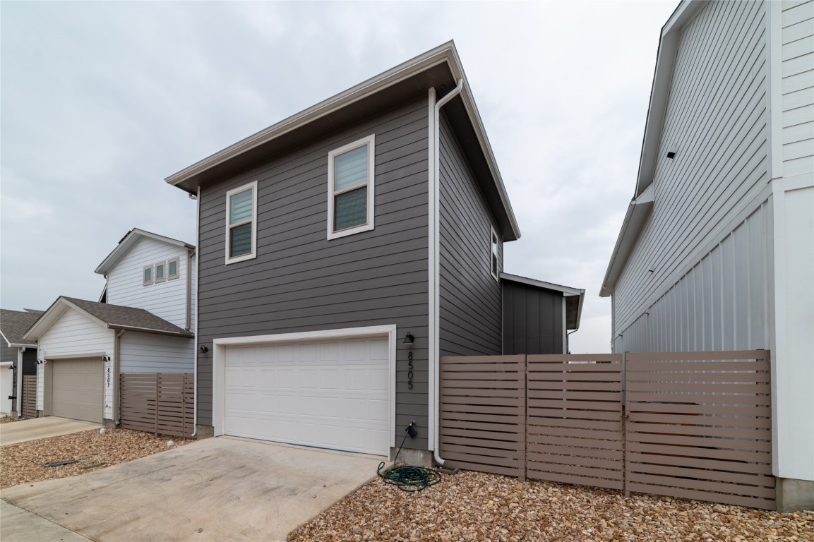8505 Leroi Drive, Unit 358 Austin, TX 78744 - Photo 7 of 37 a view of a house with garage