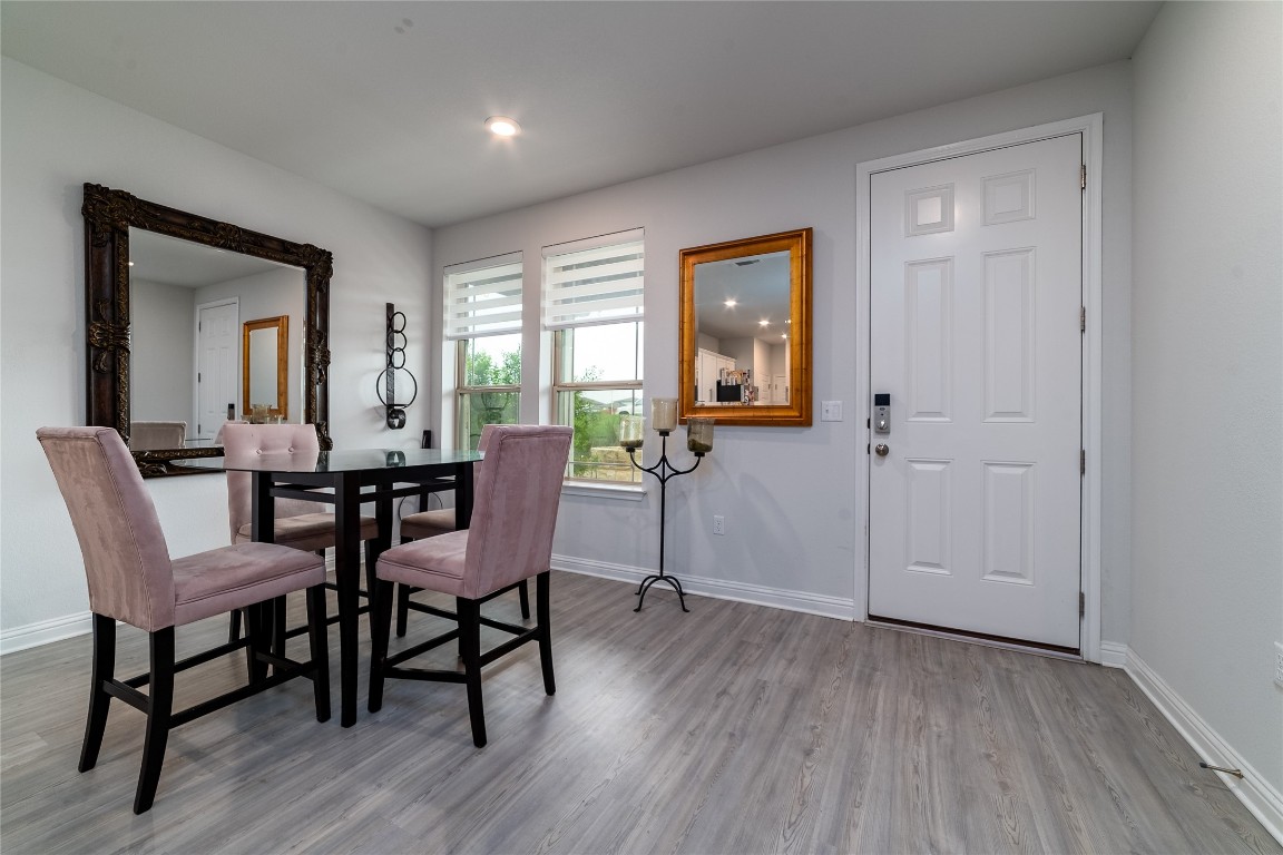 8505 Leroi Drive, Unit 358 Austin, TX 78744 - Photo 9 of 37 a view of a livingroom with furniture and wooden floor