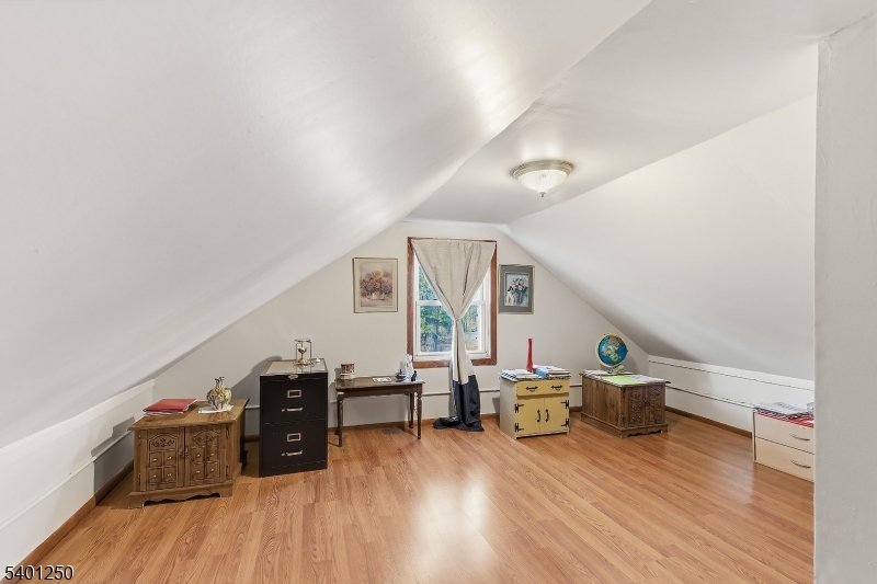 491 Lakehurst Road Browns Mills, NJ 08015 - Photo 12 of 17 a living room with furniture and wooden floor