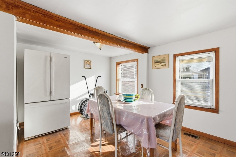 491 Lakehurst Road Browns Mills, NJ 08015 - Photo 10 of 17 a view of a dining room with furniture and wooden floor