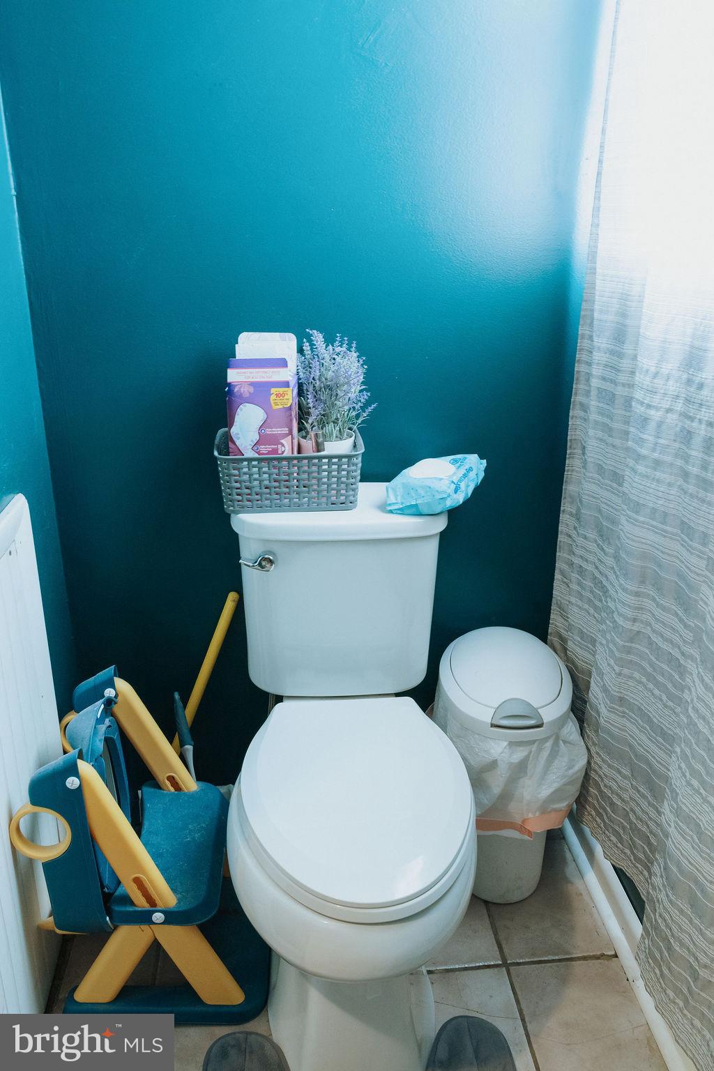 3483 Messersmith Road York, PA 17408 - Photo 12 of 18 a white toilet sitting next to a bathroom sink