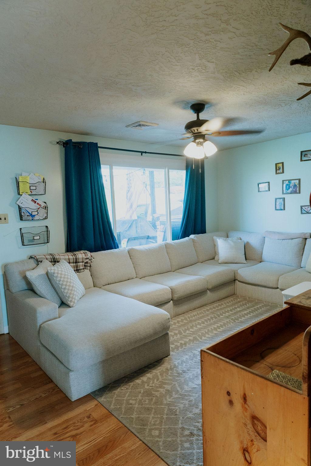 3483 Messersmith Road York, PA 17408 - Photo 3 of 18 a living room with furniture and a large window
