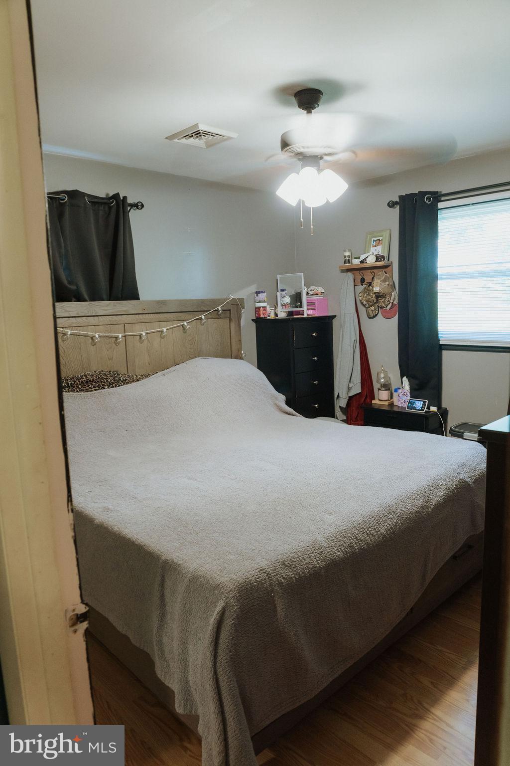 3483 Messersmith Road York, PA 17408 - Photo 8 of 18 a bed room with a bed window and a television
