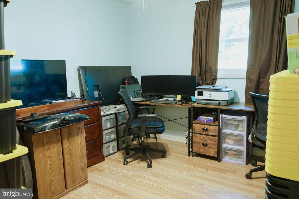 3483 Messersmith Road York, PA 17408 - Photo 10 of 18 a room with furniture and a flat screen tv