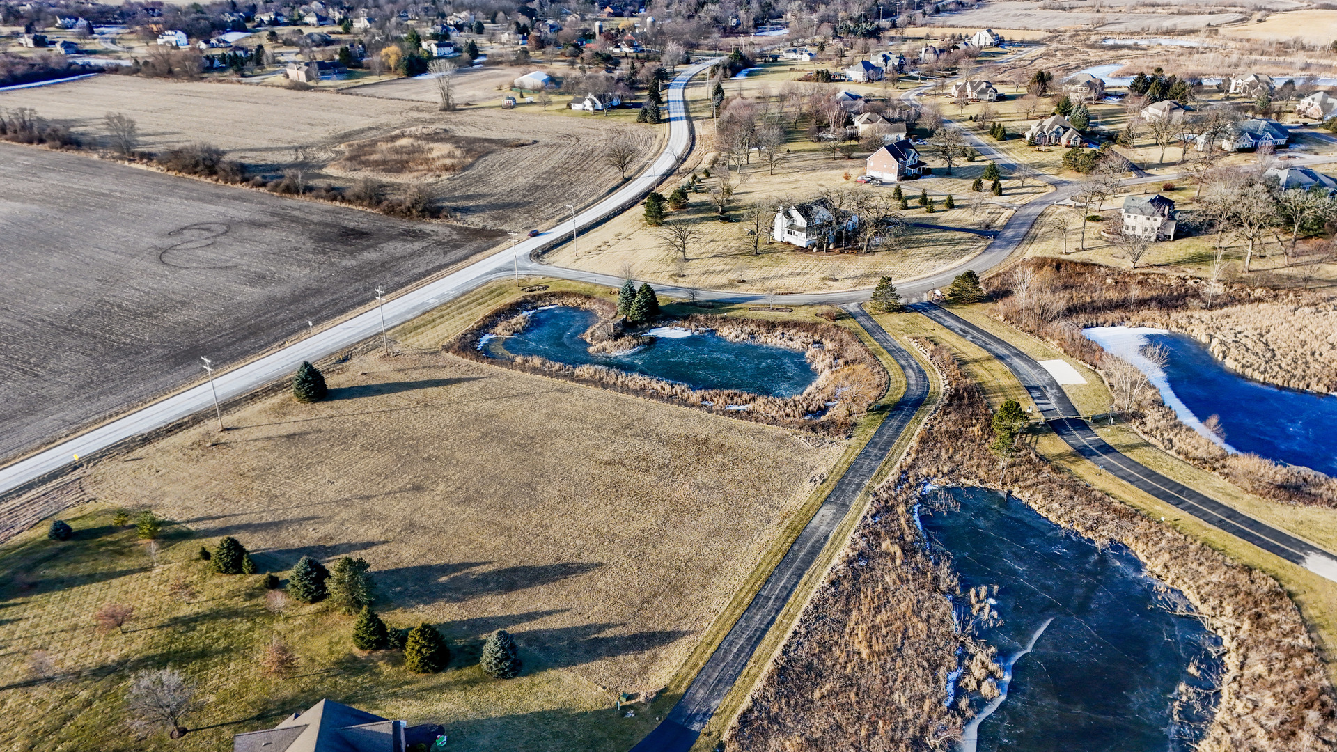 2 Stonecrest Drive Elgin, IL 60124 - Photo 5 of 12 a view of a house with a swimming pool