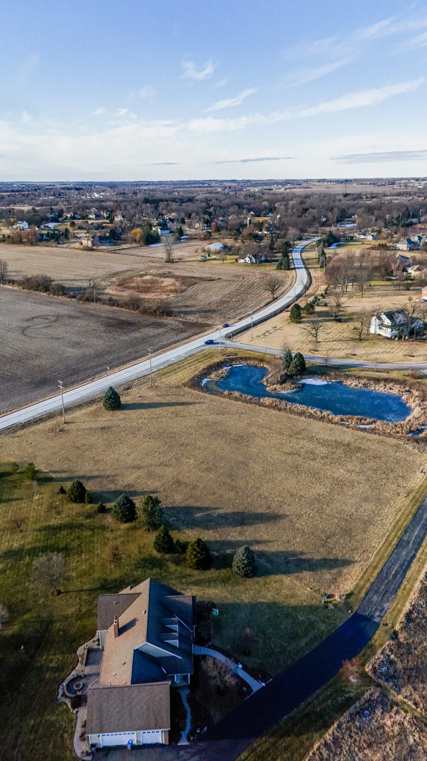 2 Stonecrest Drive Elgin, IL 60124 - Photo 8 of 12 a view of a lake with a mountain