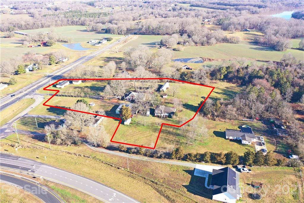 1023 George Taylor Road Monroe, NC 28110 - Photo 3 of 17 an aerial view of residential houses with outdoor space