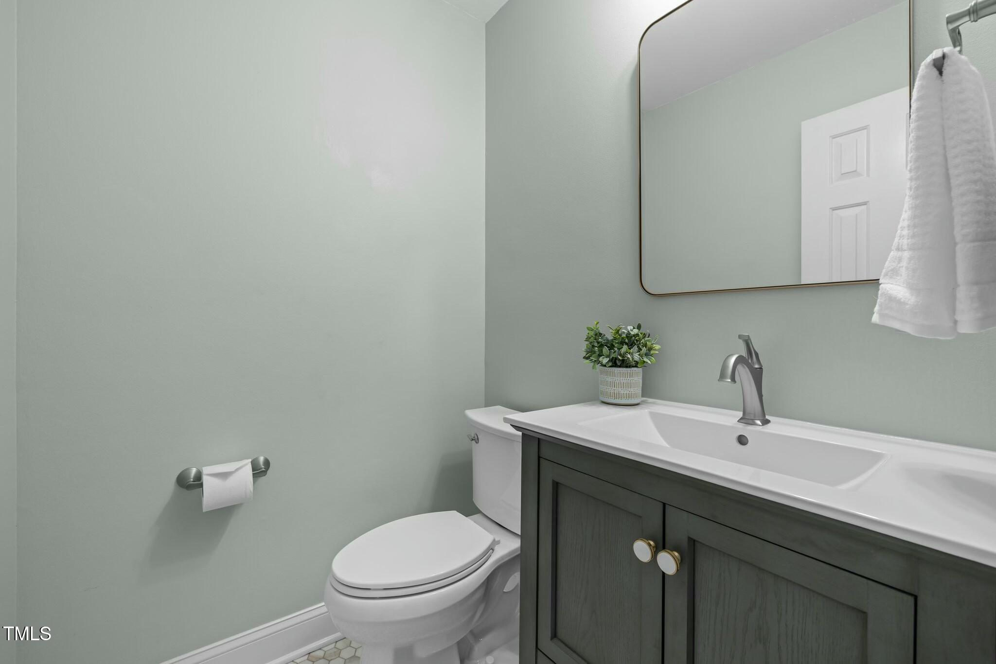 8304 Bellingham Circle Raleigh, NC 27615 - Photo 21 of 47 Updated Main Floor Powder Room