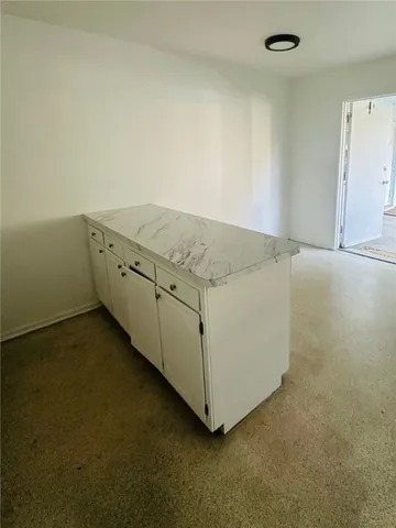 a view of a utility room with washer dryer