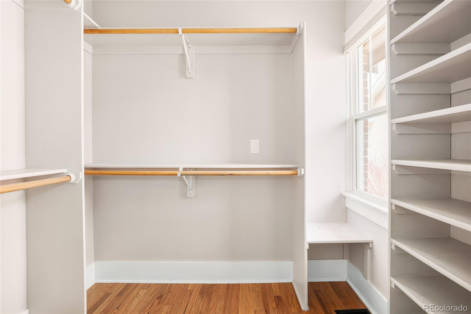 692 South Logan Street Denver, CO 80209 - Photo 19 of 40 a view of walk in closet with empty racks