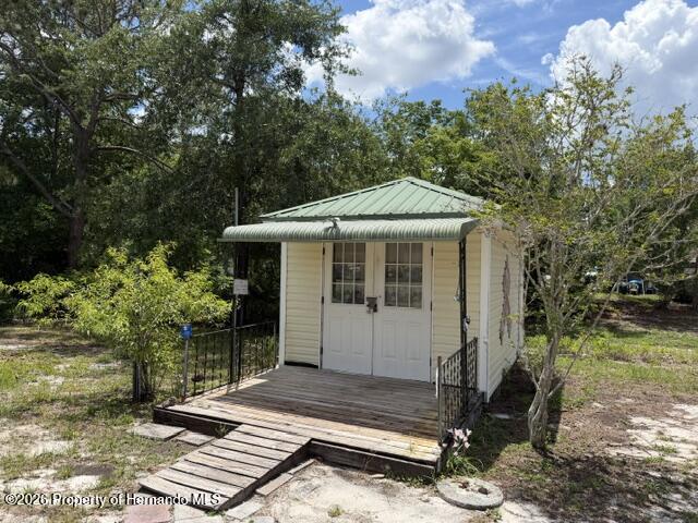 6848 Treehaven Drive Spring Hill, FL 34606 - Photo 29 of 34 Shed has electricity