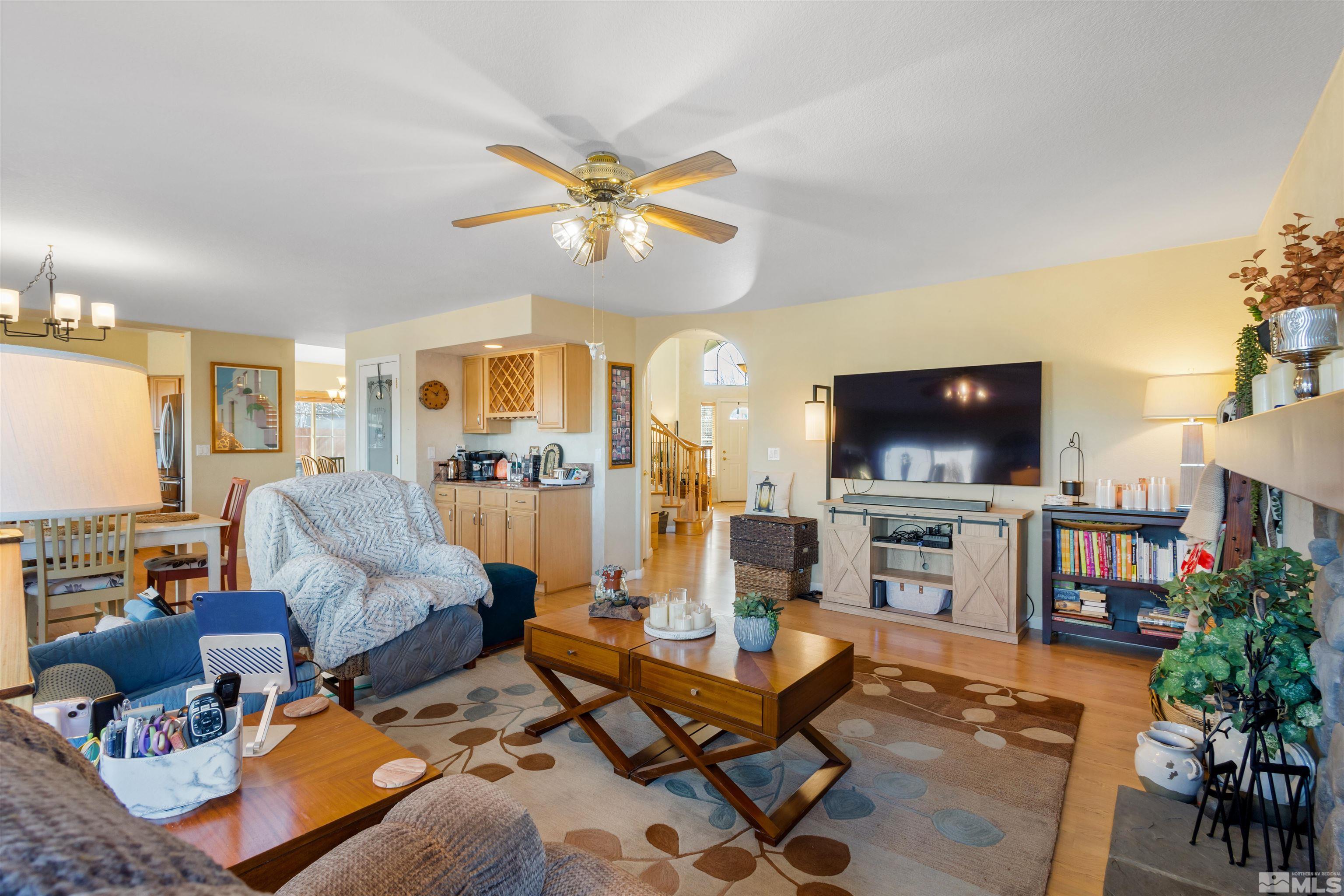 608 Sugar Tree Court Reno, NV 89511 - Photo 16 of 40 a living room with furniture and a flat screen tv