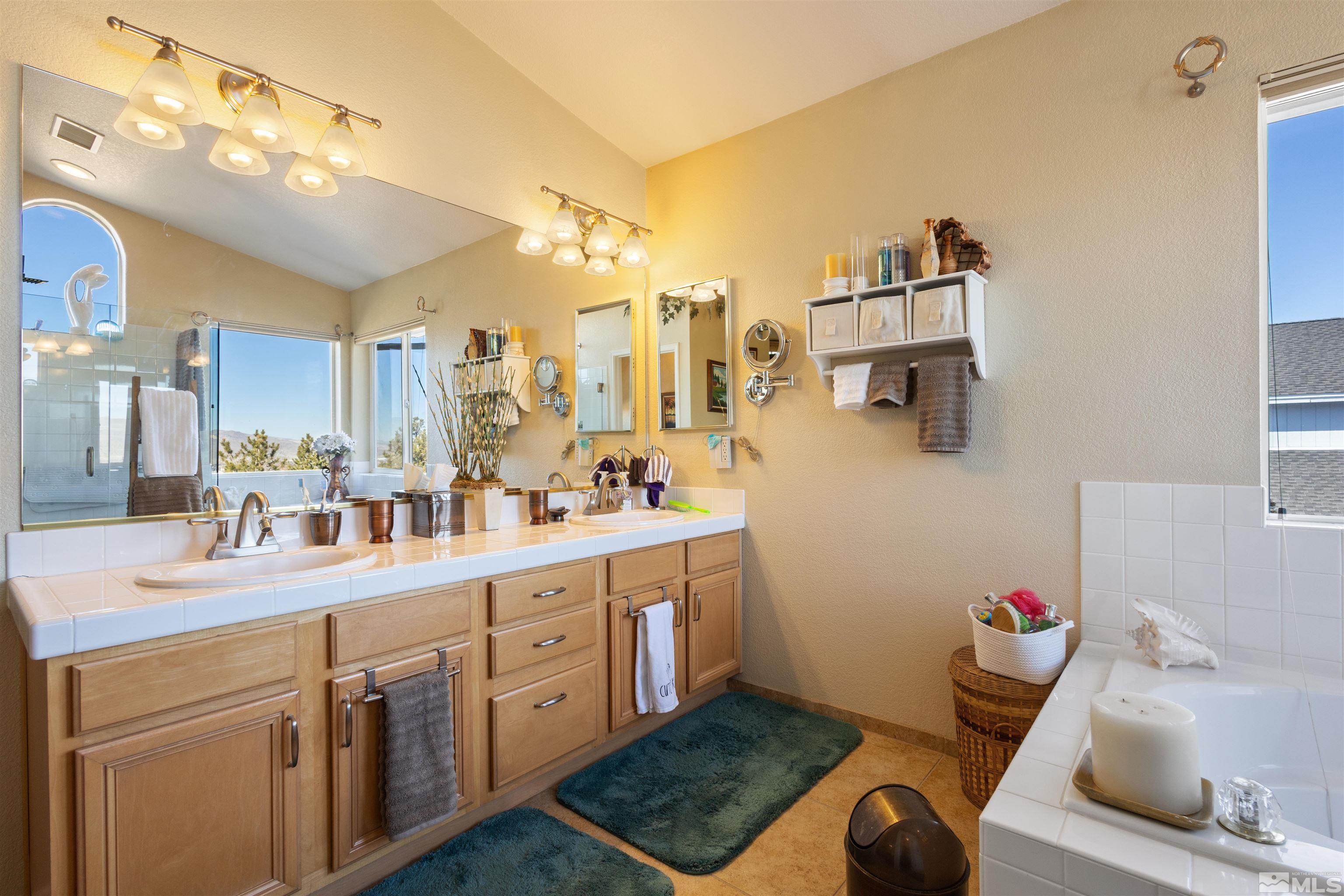 608 Sugar Tree Court Reno, NV 89511 - Photo 26 of 40 a kitchen with sink cabinets and appliances