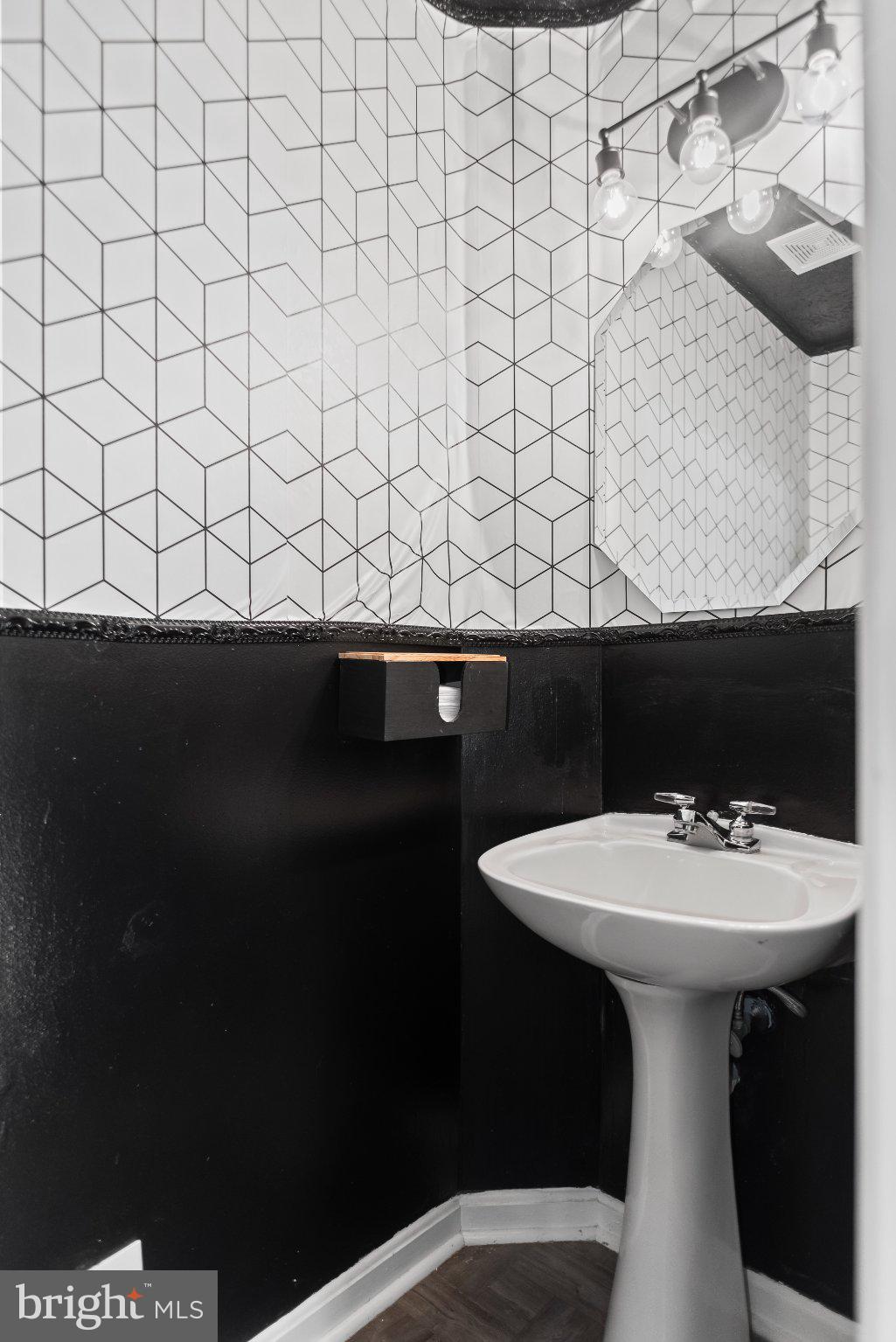 8508 Rheims Court Upper Marlboro, MD 20772 - Photo 13 of 28 Chic geometric design in a modern bath.