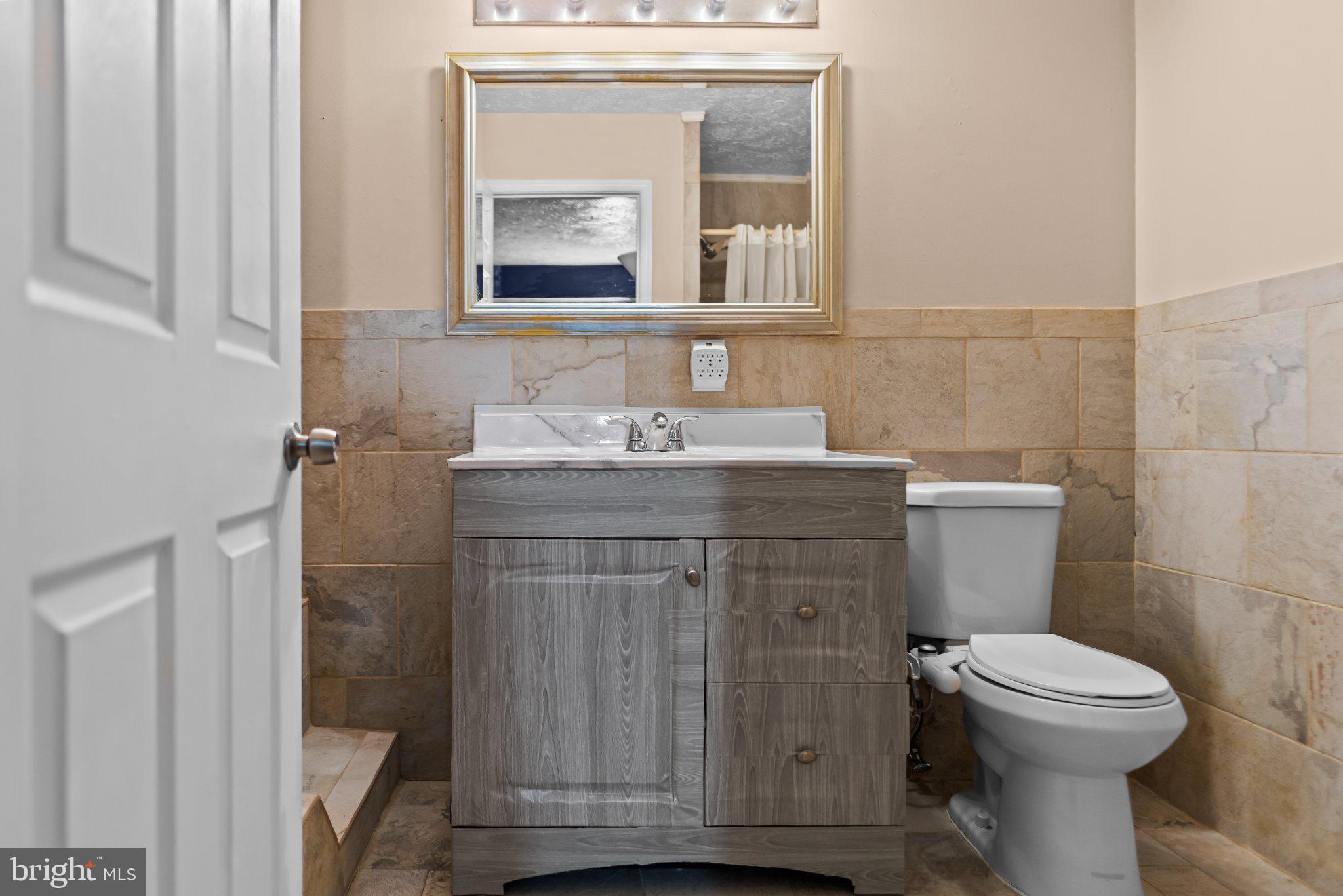 8508 Rheims Court Upper Marlboro, MD 20772 - Photo 16 of 28 Chic bathroom with elegant finishes.