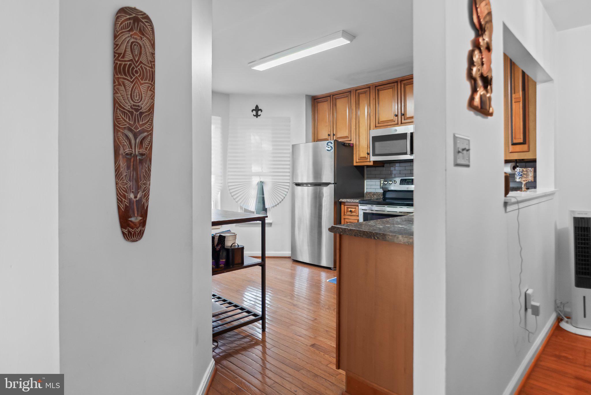 8508 Rheims Court Upper Marlboro, MD 20772 - Photo 9 of 28 Charming kitchen with warm wood accents.