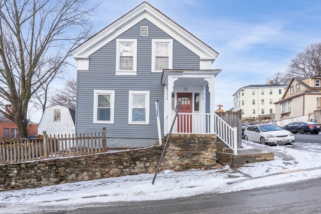 15 Reservoir Street Worcester, MA 01605 - Photo 1 of 35 a front view of a house with a yard