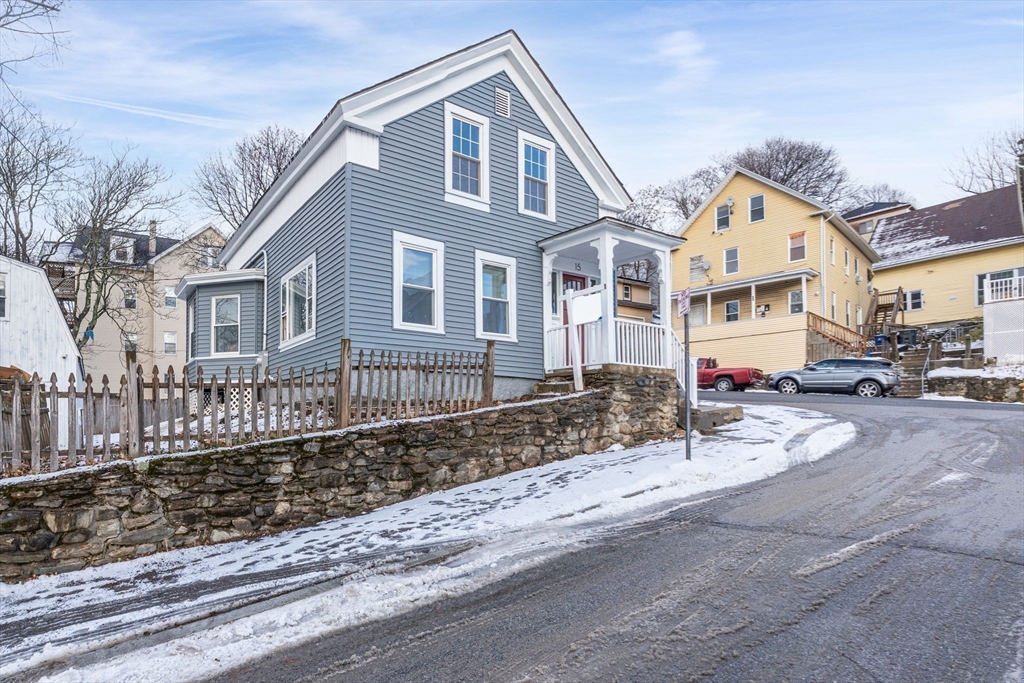 15 Reservoir Street Worcester, MA 01605 - Photo 26 of 35 a front view of a house with a yard