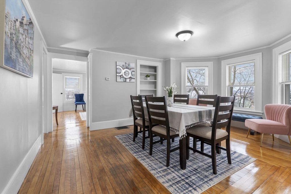 15 Reservoir Street Worcester, MA 01605 - Photo 10 of 35 a view of a dining room with furniture window and wooden floor