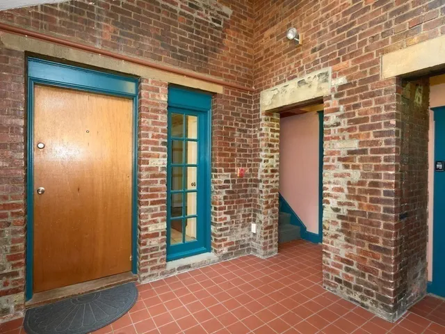a view of outdoor space and front door